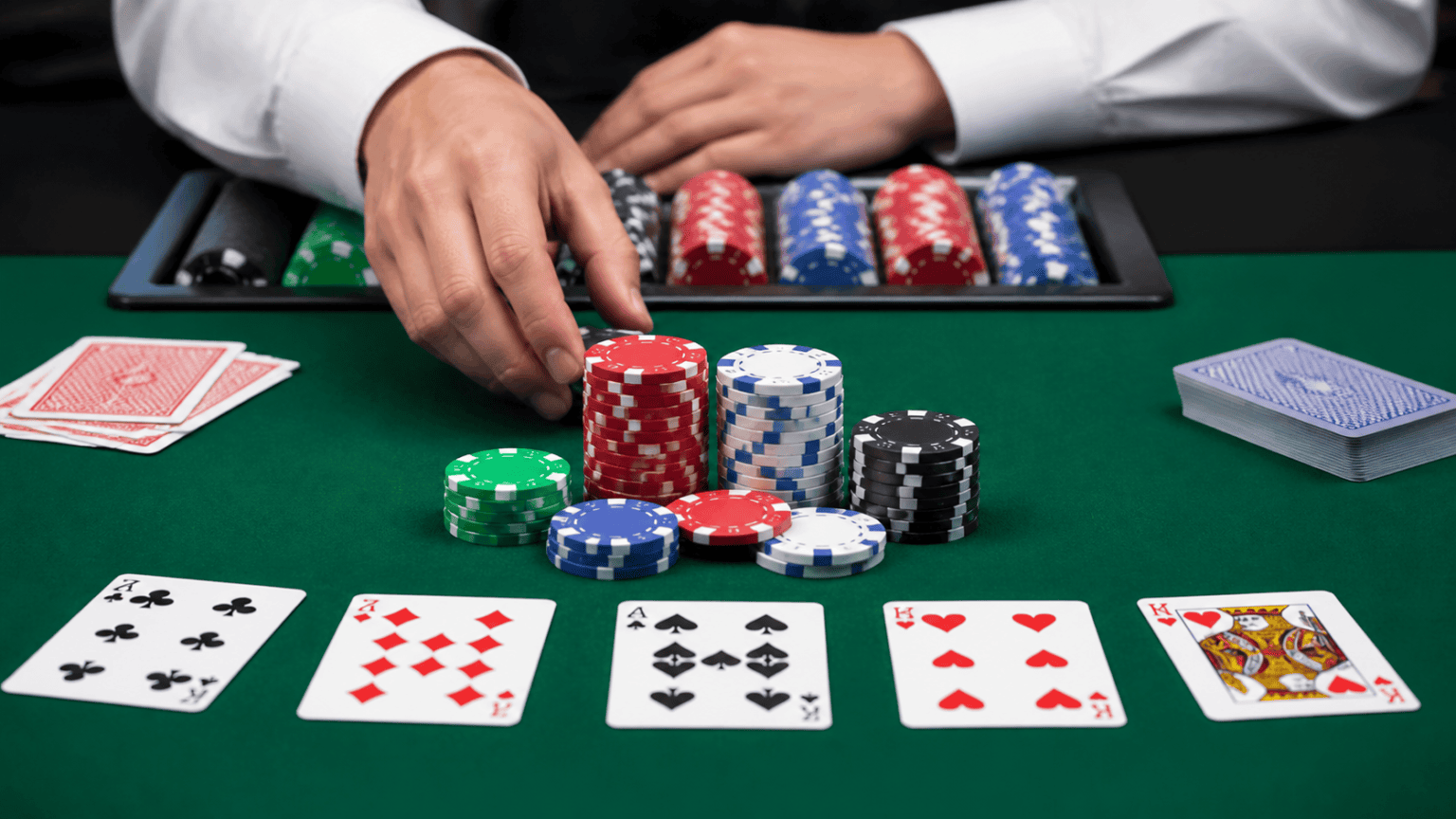 Malaysia Poker Online: A Practical Guide for Players Poker table with chips and playing cards in a casino setting